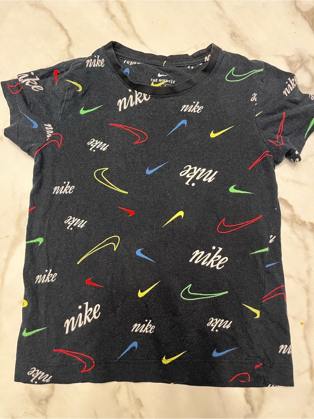 Nike Kids Black Tee with Multicolor Swoosh Prints